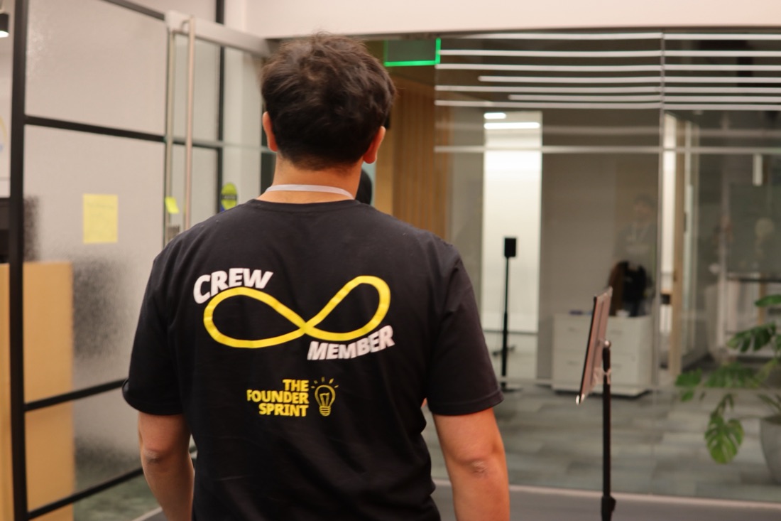 A crew member’s “Crew Member — The Founder Sprint” t-shirt with the Boundless Founder mark.