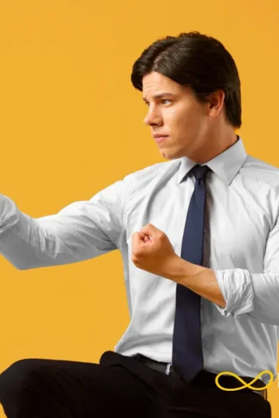 Business owner reflecting at desk after a workout, highlighting the link between physical health and clear decision-making.